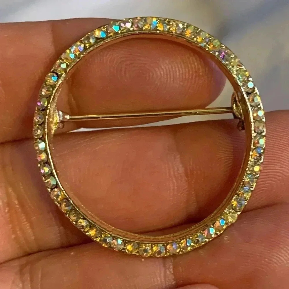 Vintage “Circle of Life” pin/ brooch gold tone iridescent glass crystals Unisex